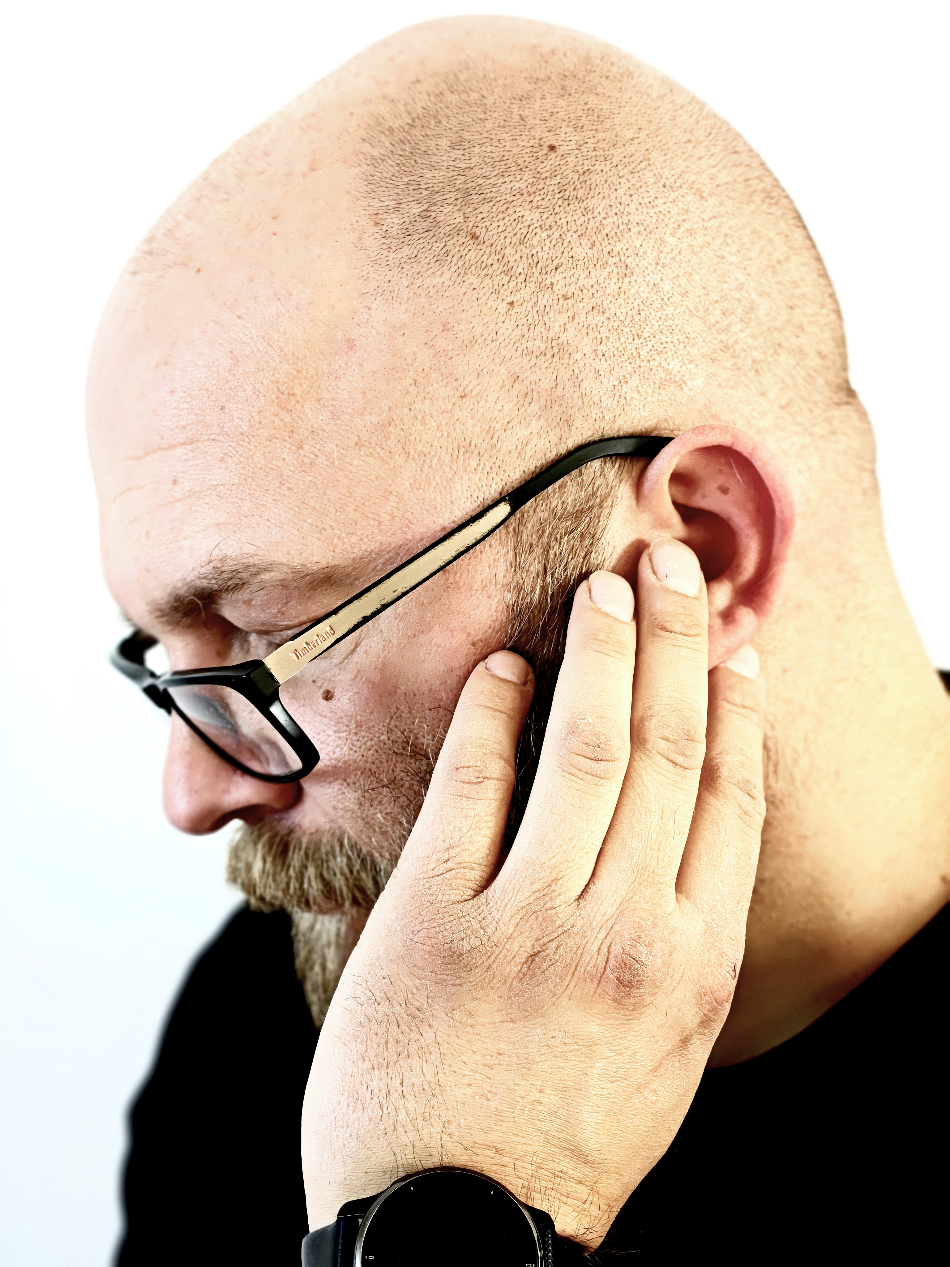 Person experiencing ear discomfort